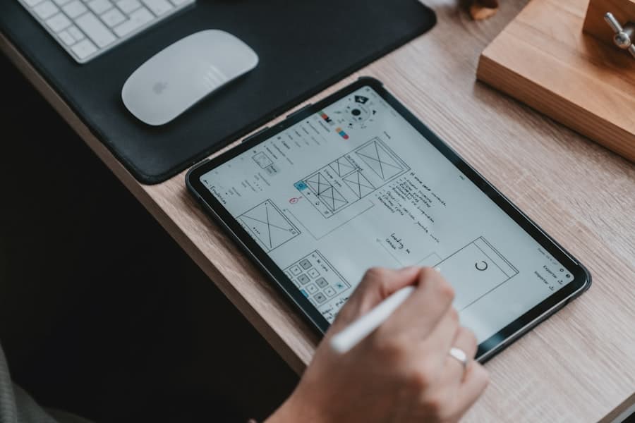 Designer reviewing interface layouts on a tablet